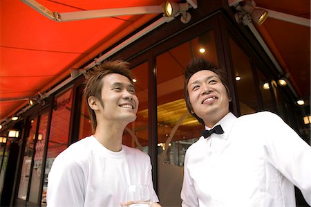 simsearch:685-02938851,k - Two waiters standing in front of coffee shop Stock Photo - Premium Royalty-Free, Code: 685-02938935