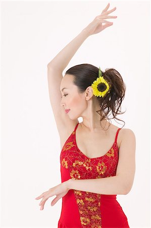 Young woman dancing salsa Stock Photo - Premium Royalty-Free, Code: 685-02939054