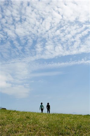 simsearch:685-02939244,k - Young couple walking, rear view Stock Photo - Premium Royalty-Free, Code: 685-02939267