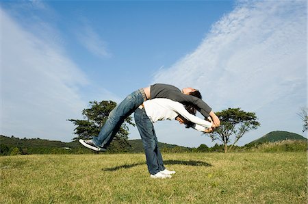 simsearch:685-02939247,k - Young couple exercising back to back Stock Photo - Premium Royalty-Free, Code: 685-02939277
