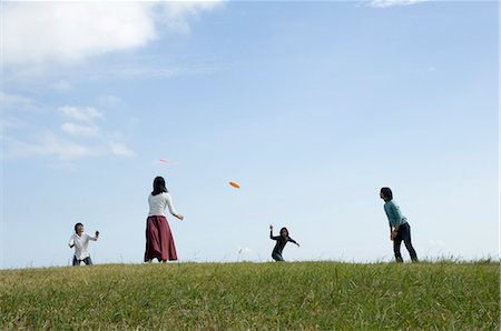 simsearch:685-02939244,k - Four young people playing with flying disc Stock Photo - Premium Royalty-Free, Code: 685-02939295