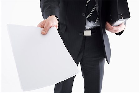 simsearch:685-02940140,k - Businessman holding sheet of paper Stock Photo - Premium Royalty-Free, Code: 685-02940121