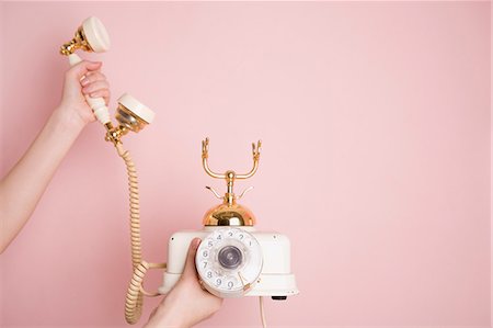 simsearch:685-02940140,k - Woman's hands holding telephone Stock Photo - Premium Royalty-Free, Code: 685-02940187