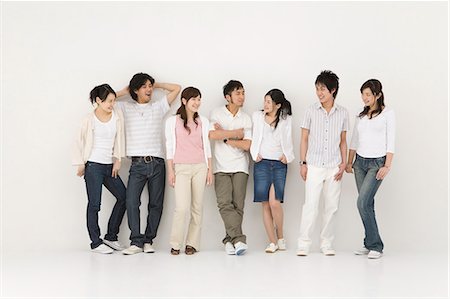 Young people standing in a line Stock Photo - Premium Royalty-Free, Code: 685-02940472