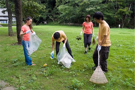 Young people cleaning park Stock Photo - Premium Royalty-Free, Code: 685-02941323