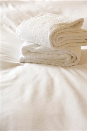 Towels on bed Stock Photo - Premium Royalty-Free, Code: 685-02941638