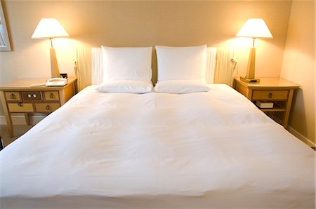 pillows in hotel room - Hotel Room Stock Photo - Premium Royalty-Free, Code: 685-02941630