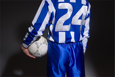 simsearch:685-02941750,k - Soccer player holding ball Stock Photo - Premium Royalty-Free, Code: 685-02941715