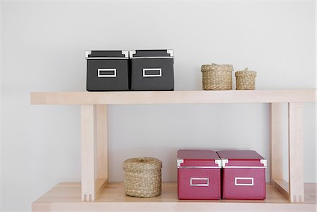 Baskets and boxes on shelf Stock Photo - Premium Royalty-Free, Code: 685-02941803