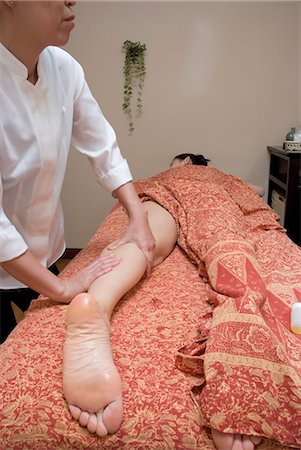 Young woman receiving massage Stock Photo - Premium Royalty-Free, Code: 685-02941917
