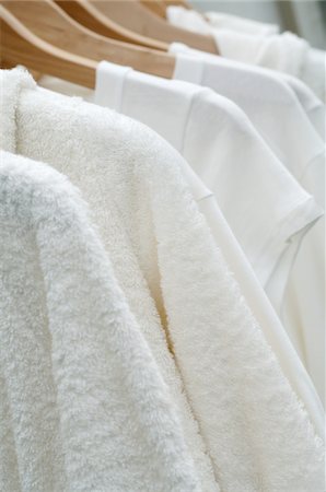 simsearch:6107-06117458,k - Bathrobes hanging on clothes hangers Stock Photo - Premium Royalty-Free, Code: 689-05610155