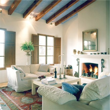 Living room with fireplace Stock Photo - Premium Royalty-Free, Code: 689-05610373