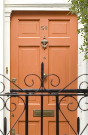 front door with number - Closed front door Stock Photo - Premium Royalty-Free, Code: 689-05610398