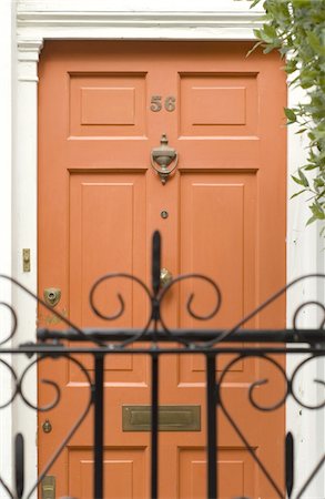 private house - Closed front door Stock Photo - Premium Royalty-Free, Code: 689-05610398