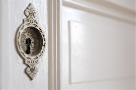 simsearch:689-05611664,k - Keyhole at a door Foto de stock - Sin royalties Premium, Código: 689-05610526