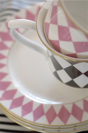 dinnerware - Coffee cups on plates Stock Photo - Premium Royalty-Free, Code: 689-05610835