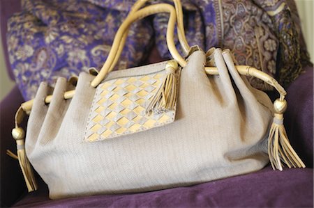 Handbag on couch Stock Photo - Premium Royalty-Free, Code: 689-05610915