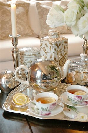 Tray with tea on coffee table Fotografie stock - Premium Royalty-Free, Codice: 689-05610940