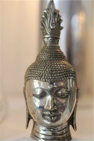 Head of a statue of Buddha Stock Photo - Premium Royalty-Free, Code: 689-05611255