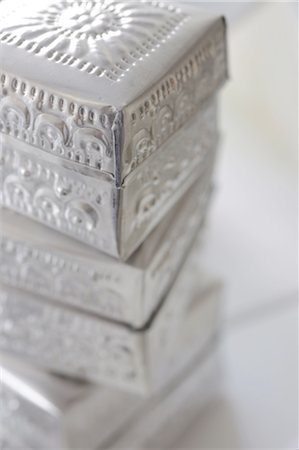 embellished - Stack of silver boxes Stock Photo - Premium Royalty-Free, Code: 689-05611253