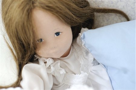 pillow and cushion - Old-fashioned doll Stock Photo - Premium Royalty-Free, Code: 689-05611461