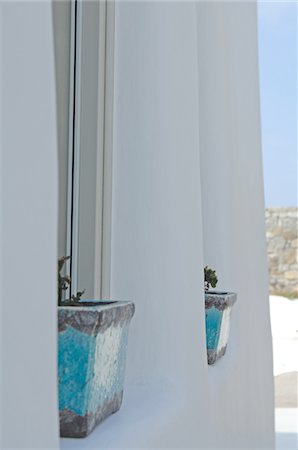 facade - Two flowerpots on windowsill Stock Photo - Premium Royalty-Free, Code: 689-05611638