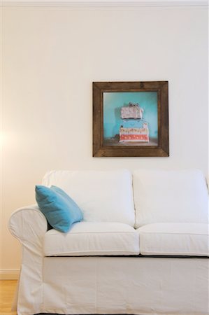 Painting above couch in living room Stock Photo - Premium Royalty-Free, Code: 689-05611718