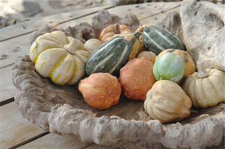 Bowl with ornamental gourds Stock Photo - Premium Royalty-Free, Code: 689-05611751