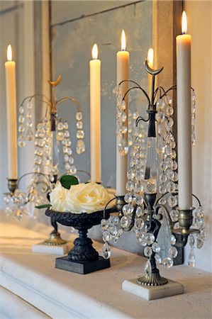 embellished - Burning candles and blossoms on ledge Stock Photo - Premium Royalty-Free, Code: 689-05611840