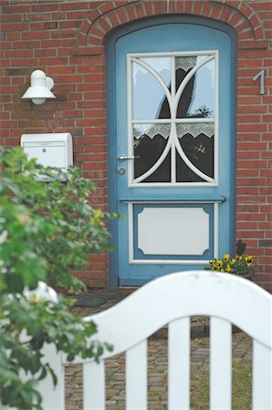 front door plant - Entrance to residential house Stock Photo - Premium Royalty-Free, Code: 689-05611889