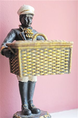 figurines - Blackamoor figurine holding basket Stock Photo - Premium Royalty-Free, Code: 689-05612122