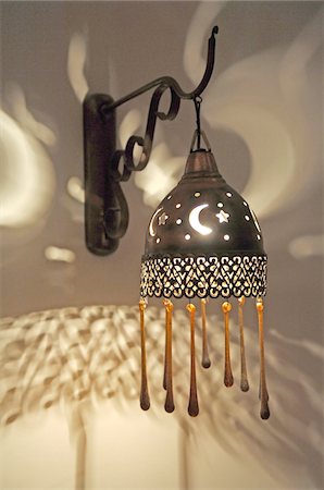 decor chic - Wall lamp with moon and stars pattern Stock Photo - Premium Royalty-Free, Code: 689-05612177