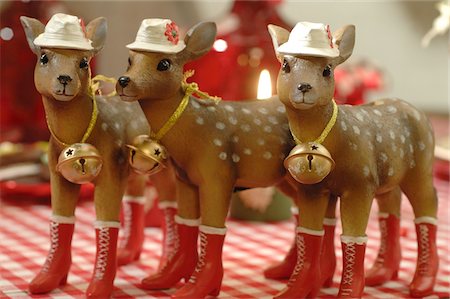 Three Christmas deer figurines standing in row Stock Photo - Premium Royalty-Free, Code: 689-05612263