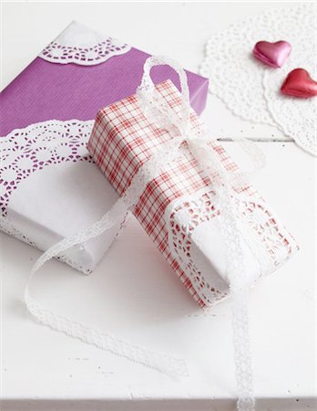 ribbon detail - Wrapped gifts with hearts Stock Photo - Premium Royalty-Free, Code: 689-05612375