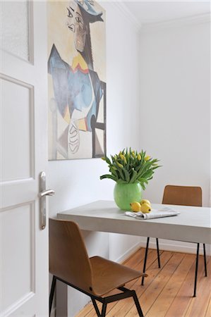 plant in home decor - Painting above table with bunch of flowers Stock Photo - Premium Royalty-Free, Code: 689-05612386