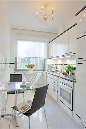 refrigerator at home - Kitchen with dining area Stock Photo - Premium Royalty-Free, Code: 689-05612433