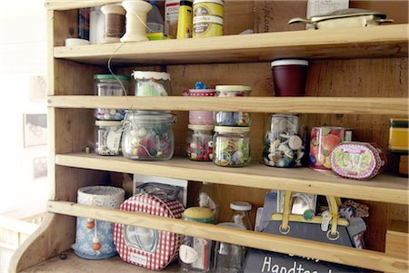 preserving jar - Shelf with different accessories Stock Photo - Premium Royalty-Free, Code: 689-05612466