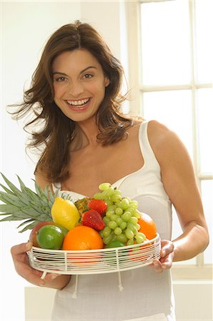 photo of model woman with grapes - Woman with fruit Stock Photo - Premium Royalty-Free, Code: 689-03124532