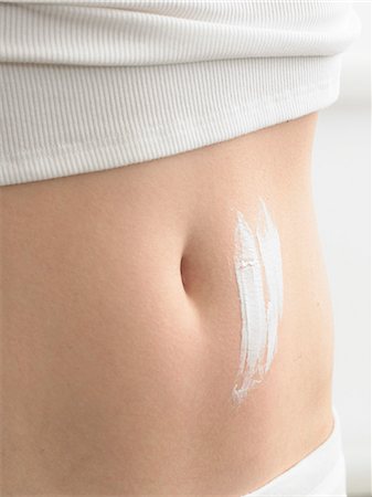 simsearch:689-03123953,k - Cream streaks on a belly Stock Photo - Premium Royalty-Free, Code: 689-03124829