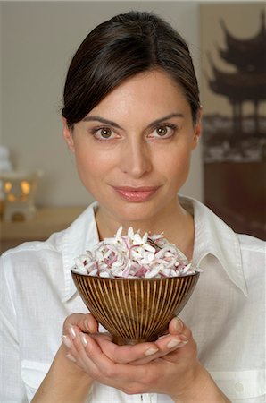 simsearch:689-03125518,k - Woman holding a bowl full of blossoms Stock Photo - Premium Royalty-Free, Code: 689-03124974