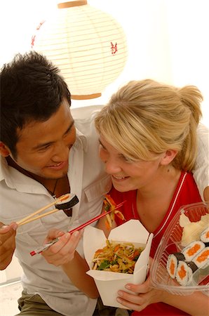 people eating seafood - Couple with Asian food Stock Photo - Premium Royalty-Free, Code: 689-03125584