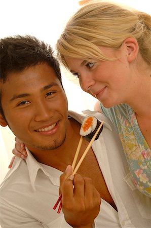 simsearch:689-03124356,k - Couple with Asian food Stock Photo - Premium Royalty-Free, Code: 689-03125586