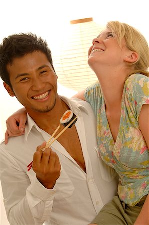 simsearch:689-03124356,k - Couple with Asian food Stock Photo - Premium Royalty-Free, Code: 689-03125588