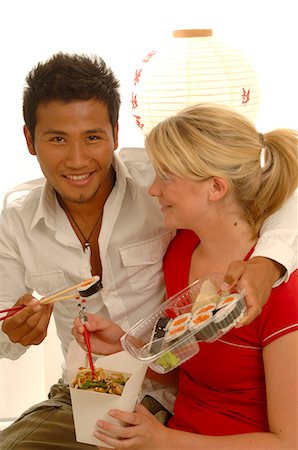 simsearch:689-03124356,k - Couple with Asian food Stock Photo - Premium Royalty-Free, Code: 689-03125581