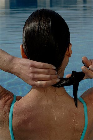 simsearch:689-03124937,k - Woman in the swimming pool - back view Fotografie stock - Premium Royalty-Free, Codice: 689-03126531