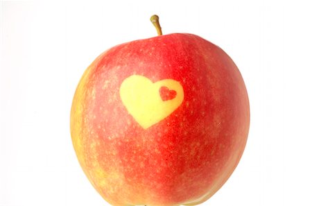 Apple with a heart pattern Stock Photo - Premium Royalty-Free, Code: 689-03126847