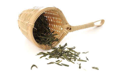 Bamboo tea strainer with green tea Stock Photo - Premium Royalty-Free, Code: 689-03126951