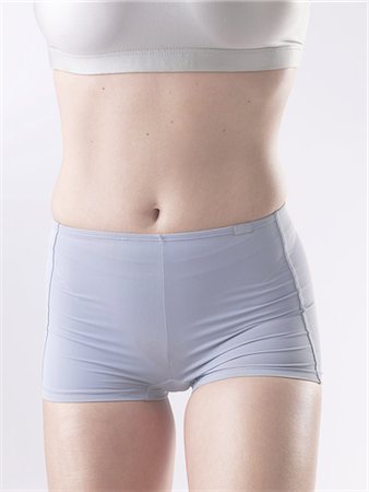 slim belly - Woman with sportswear,belly Stock Photo - Premium Royalty-Free, Code: 689-03127497