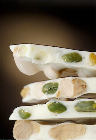 White chocolate with nut and pistachio Foto de stock - Sin royalties Premium, Código: 689-03129669