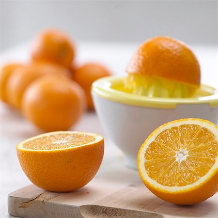 squeezer - fresh pressed orange juice Stock Photo - Premium Royalty-Free, Code: 689-03123838